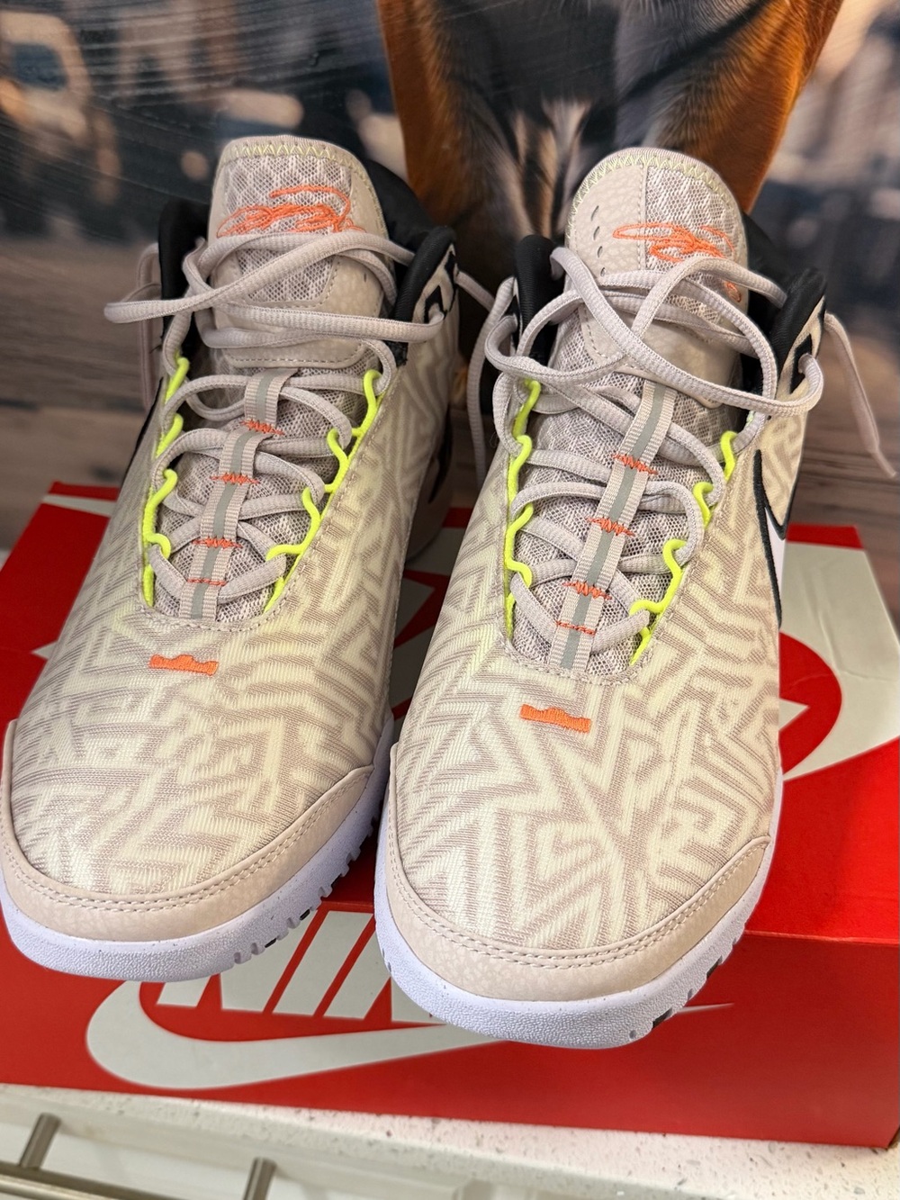 Nike Beige Patterned Sneakers with Neon Yellow and Orange Accents